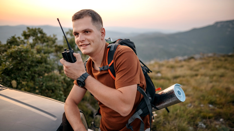 man using walkie talkie