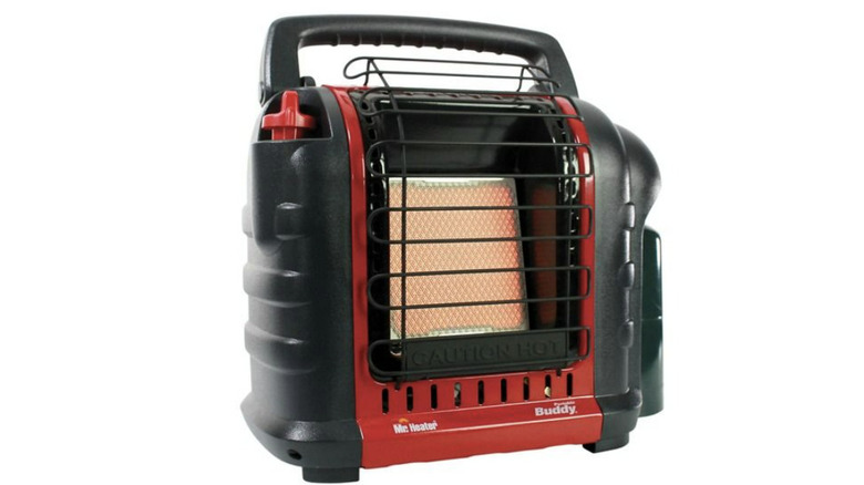 hands warming up with Mr Heater Portable Buddy
