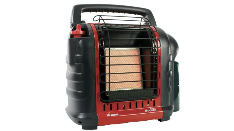 hands warming up with Mr Heater Portable Buddy