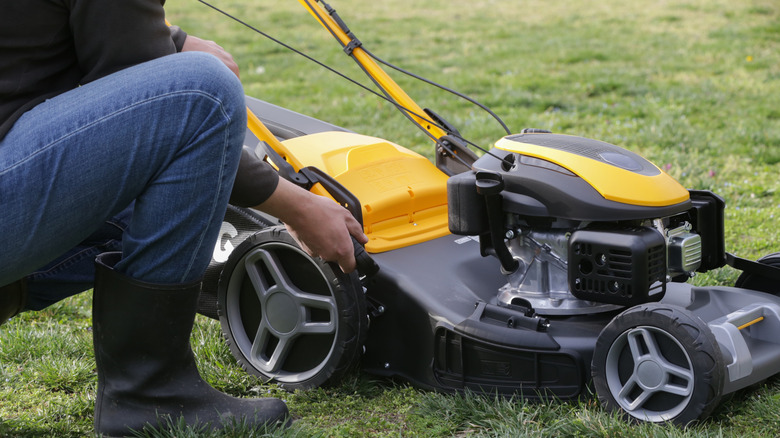 Lawnmower being prepared/serviced