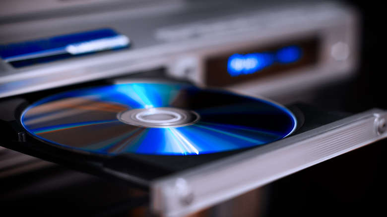 CD resting in the disk drive of a video player.