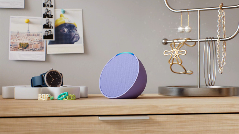 Purple Echo Pop on a vanity table with women accessories