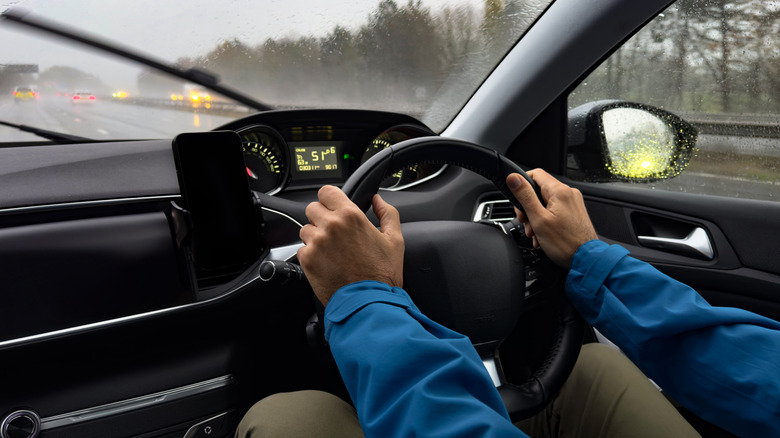 man driving car in england on right side