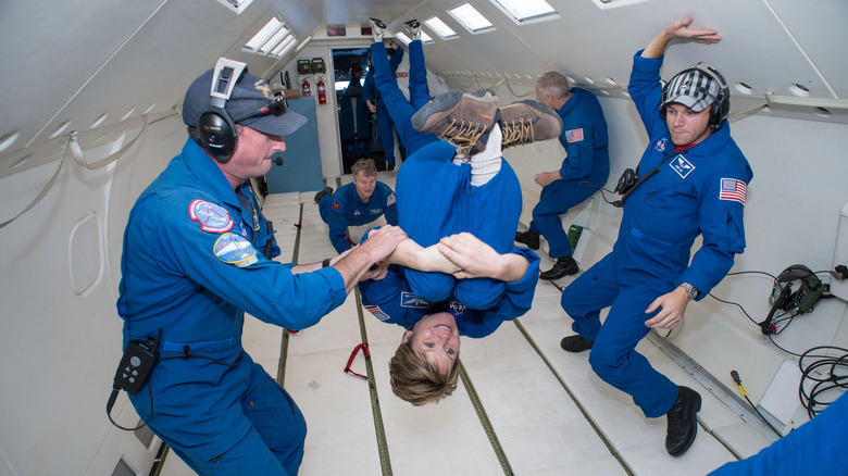 NASA participants experiencing weightless zero gravity flights.