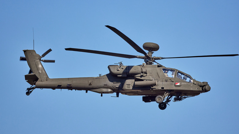 An AH-64 Apache helicopter in flight