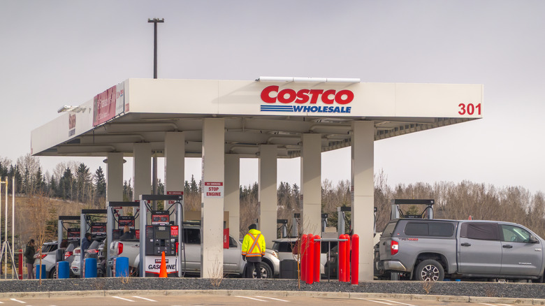 Cars getting gas at a Costco gas station.