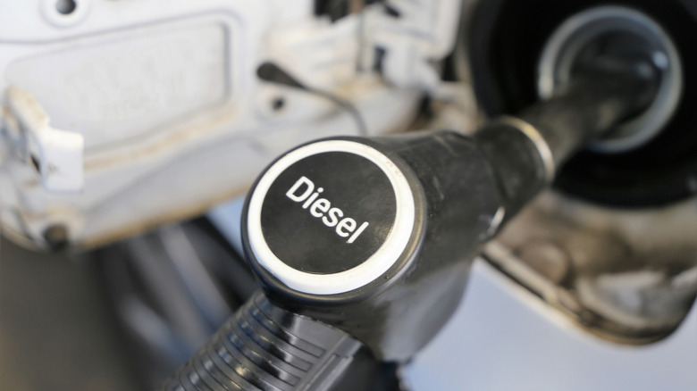 Diesel fuel pump nozzle in truck filler neck