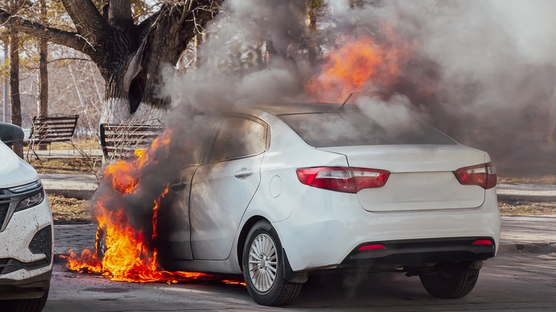 car on fire in parking lot