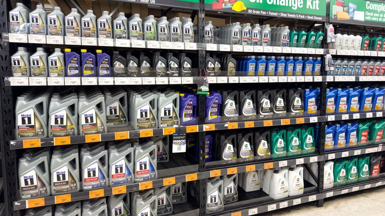 Oil containers on shelves in auto parts store