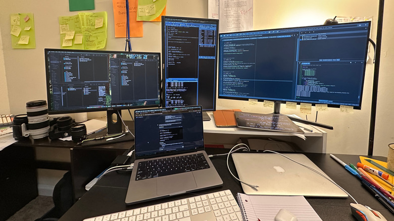 MacBook connected to multiple monitors