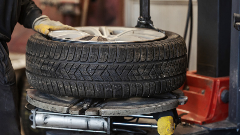 A tire on a repair stand