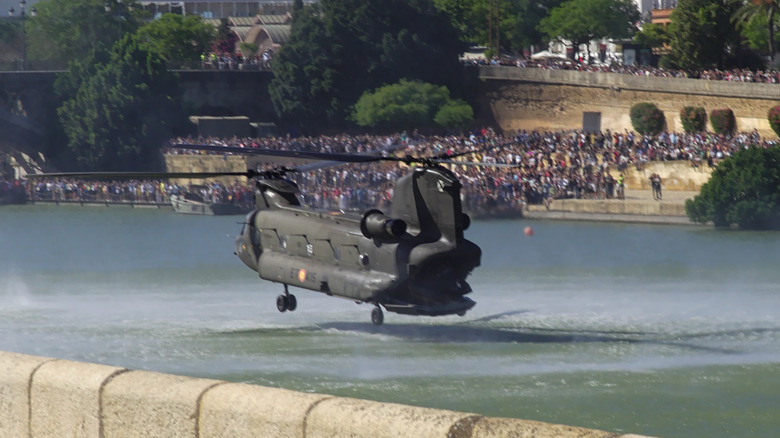 Chinook helicopter hovering just above water