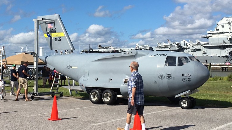 the mini C-17 being transported in a parking lot