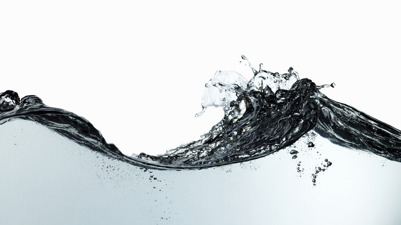 Side-on image of flowing water showing wave detail