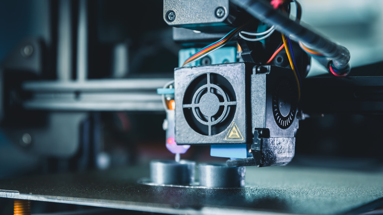 Modern 3d printer producing a new prototype model