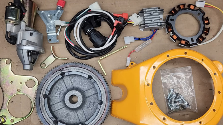 Components of a WSEPO electric starter upgrade kit for small diesel engine