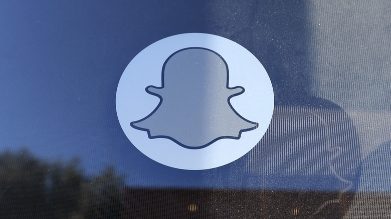 snapchat logo reflection screen grid