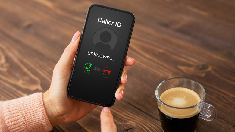 Person receiving a call from an unknown caller