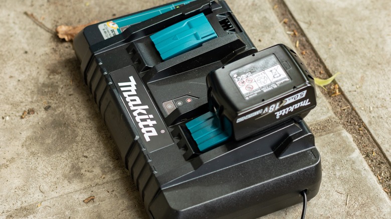 18V Makita battery in a charging dock.