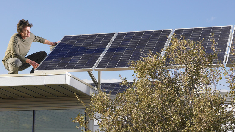 Solar panels being installed on roof