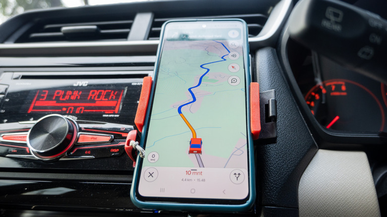 Google Maps app on a smartphone in a car.
