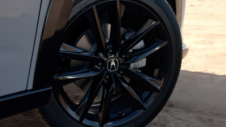 Close-up of Acura logo on black Acura ADX wheel
