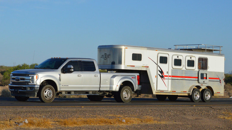 Ford Super Duty with a gooseneck trailer