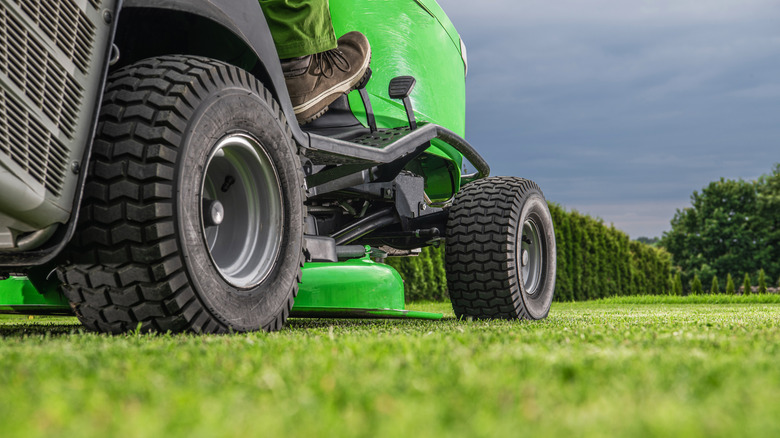 A riding lawn mower on grass