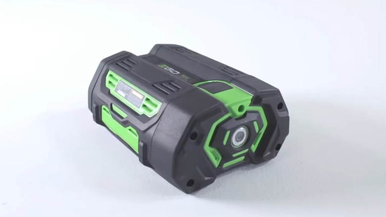 An EGO lawn mower battery against a white background.