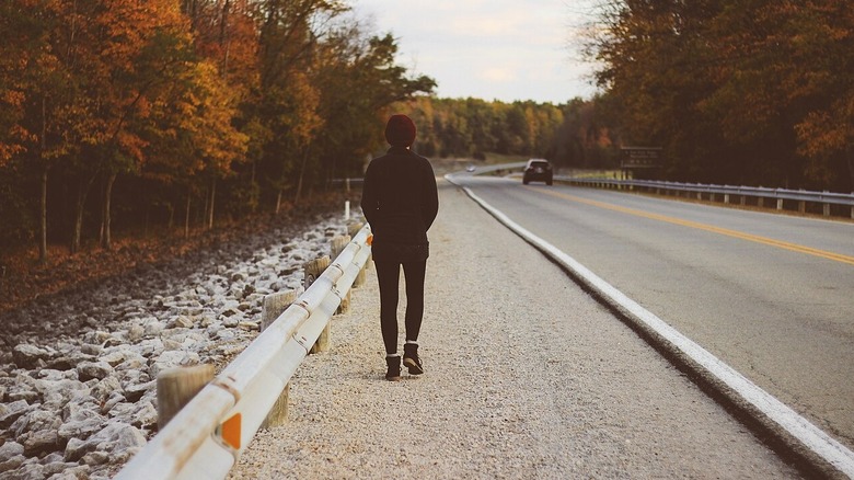 A person walking through Caesar Creek Gorge State Nature Preserve, Oregon, United States