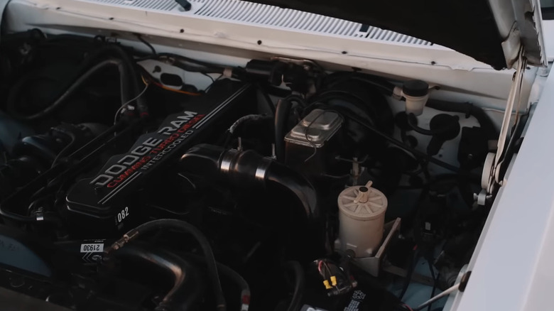 A 5.9-liter Cummins diesel engine underneath an open car hood