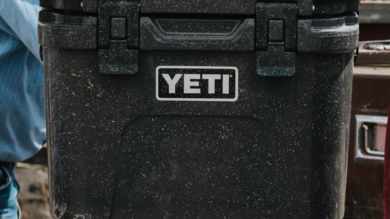 A Yeti cooler in the back of a truck