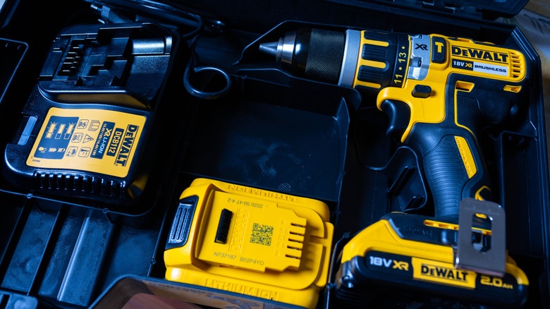 Dewalt DCD795D2-QW cordless impact drill screwdriver with two baterries and charger on Tstak box.