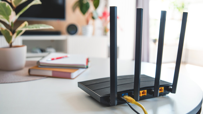Black Wi-Fi router on the living room table
