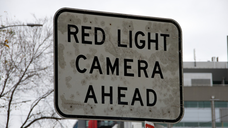 Sign warning red light camera ahead