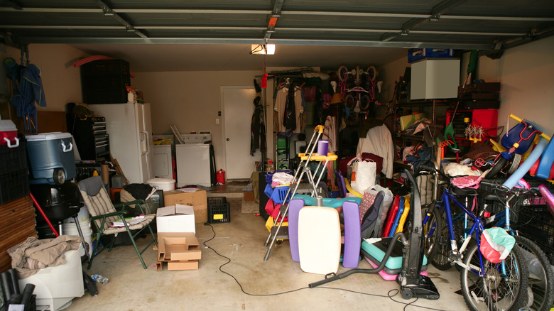 A messy garage full of various items