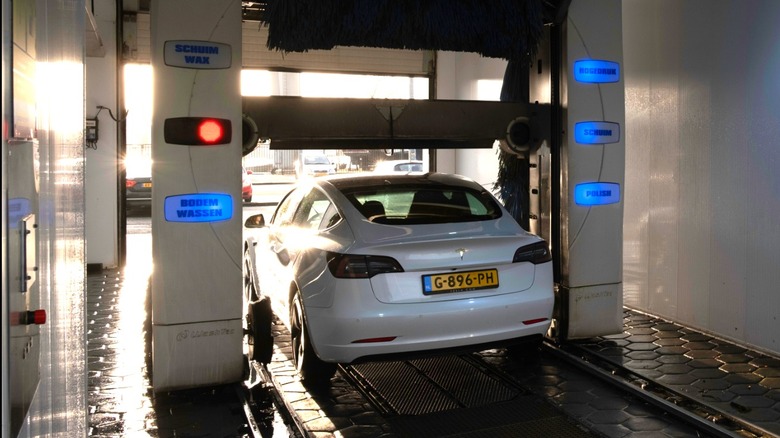 tesla vehicle in car wash