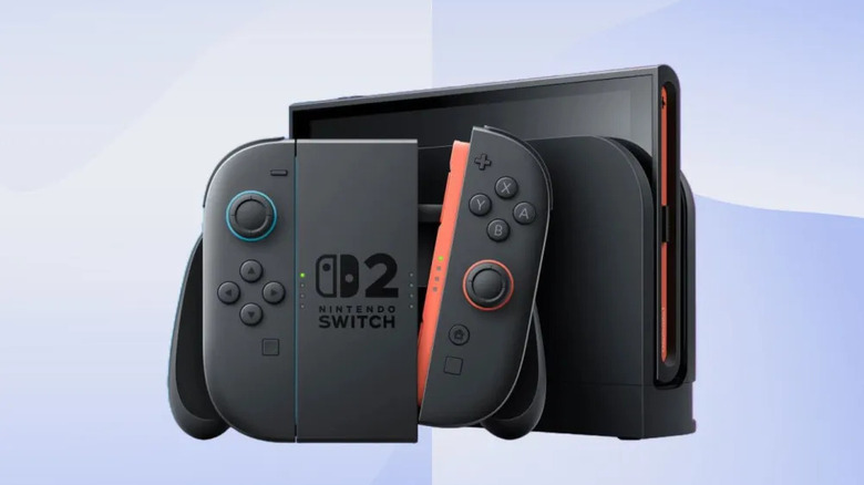 Nintendo Switch 2 and docking module presenting controllers in front of docked tablet