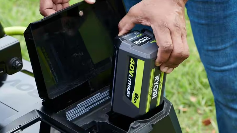 Removing a 40V Ryobi battery from a charger