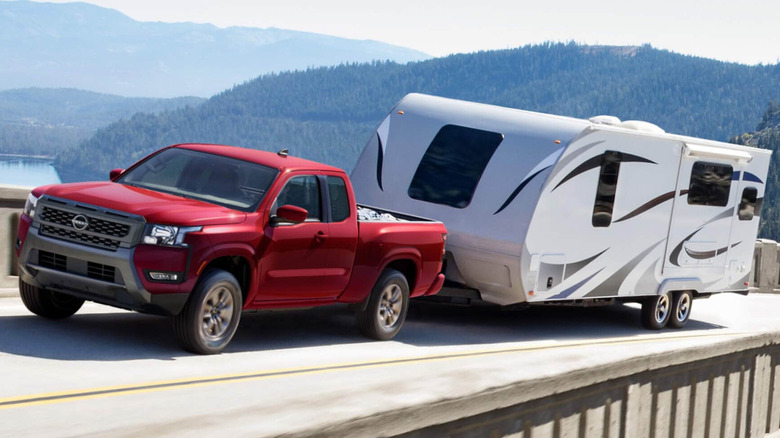 2025 Nissan Frontier towing a mobile home