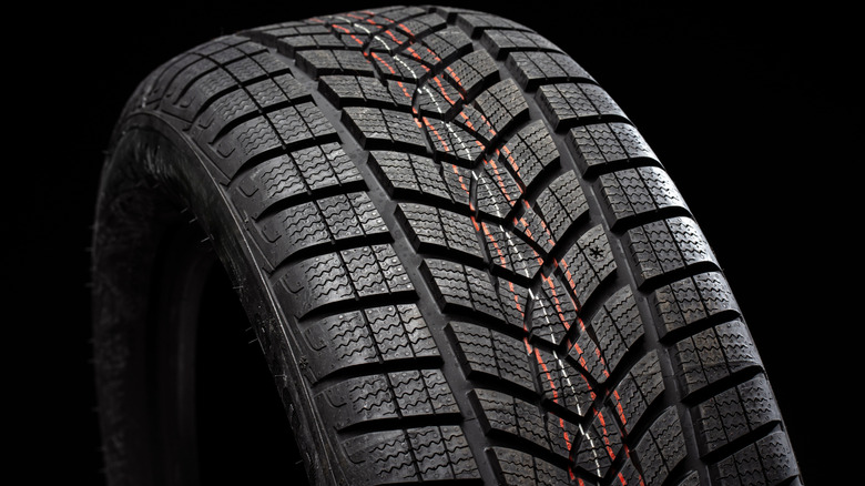 A new tire with treads