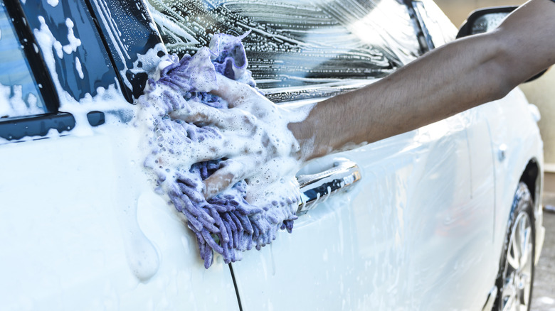 Washing side of car