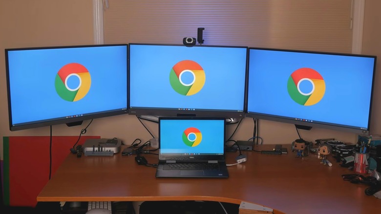 A Chromebook connected to multiple monitors.