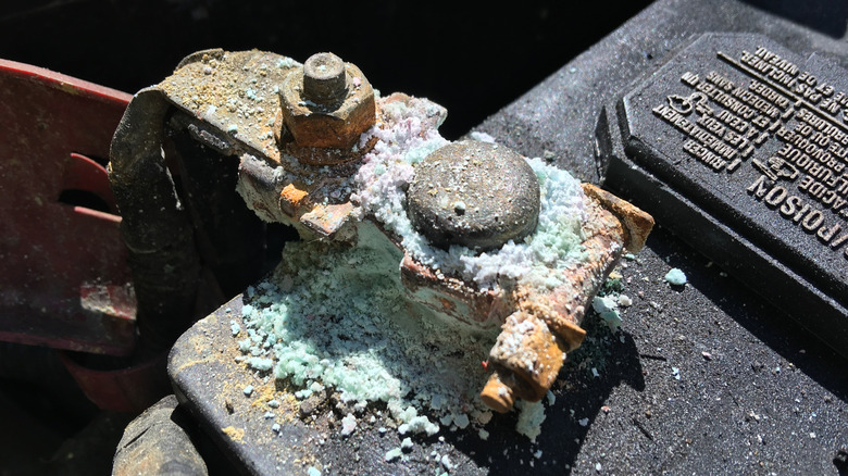 Close up of corroded car battery