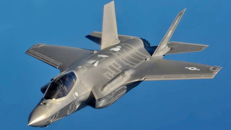 An F-35A flying over blue skies