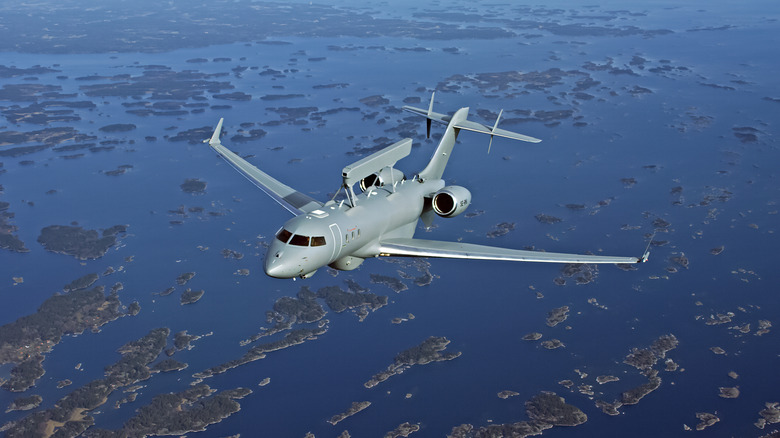 Saab GlobalEye aircraft flying over islands