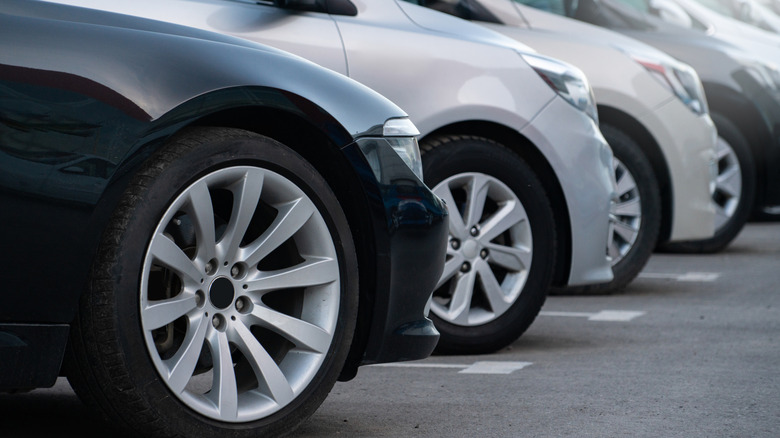 Several used cars for sale in a row