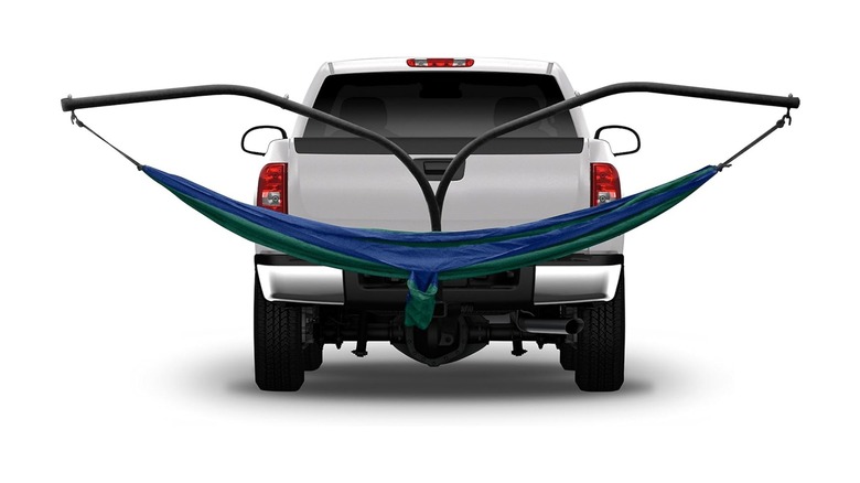 A pickup truck with a Hammaka hammock hitch stand installed