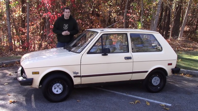 Doug De Muro reviewing a Yugo GV