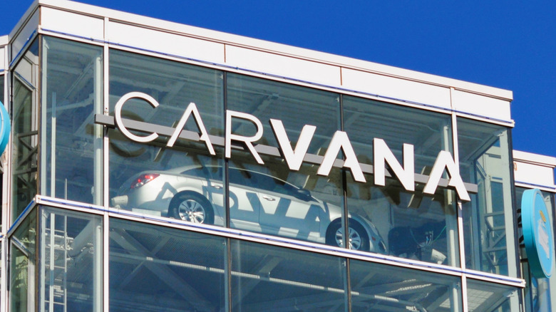 A Carvana car tower in the daytime